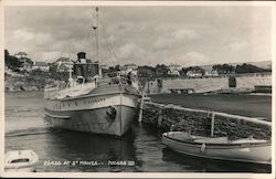 Boat Anchored at Pier Postcard