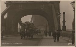 London. On tower bridge Postcard