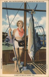 Hey, you're supposed to be looking at the sailfish. Plenty of both at Miami, Florida Frank Bell Postcard Postcard Postcard