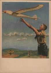 Hitler Youth Boy Learning about Flying with Airplane Model Postcard