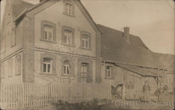 Family Outside House Bavaria Germany