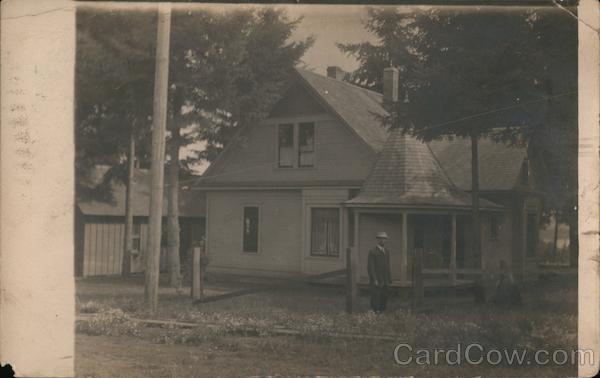 Man Standing in Front of a Small House Camas Washington