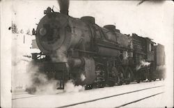 Train on snowfilled tracks, Tennessee Pass, Colo. Postcard