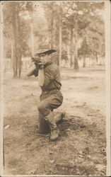 Soldier Pointing Gun at Camera, Camp Hancock Postcard