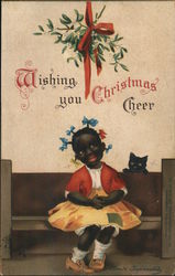 Wishing You Christmas Cheer/child and cat sitting on bench under mistletoe with red ribbon Children Postcard Postcard Postcard