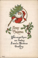 Merry Christmas - Santa Carrying a Christmas Tree Postcard
