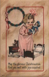A Young Girl Playing with a Doll Postcard