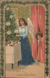 An Angel with a Candle Near a Christmas Tree Postcard