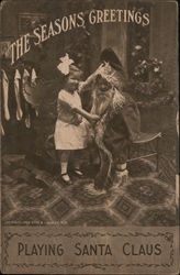 The Seasons Greetings, Playing Santa Claus Postcard