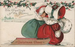 The Greetings of the Season - Two Women Walking Through the Snow Christmas Postcard Postcard Postcard