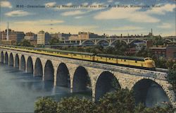 M-92- Streamliner crossing Mississippi River over Stone Arch Bridge Postcard