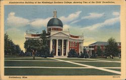 Administration Building of the Mississippi Southern College, showing two of the girls' dormitories. Postcard