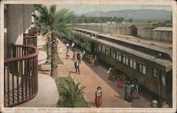 The Santa Fe Limited. Indians selling bead work in front of El Garces hotel Postcard