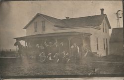 Group of men in front of house, horse, windmill West Point, NE Postcard Postcard Postcard