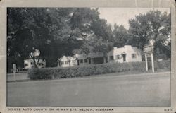 Deluxe Auto Courts on hi-way 275 Postcard