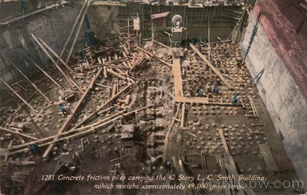 Concrete friction piles carrying the 42 story L.C. Smith Building, which weighs approximately 49,000 gross tons