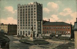 Monument Square showing Soldiers' Monument and Fidelity Building Postcard