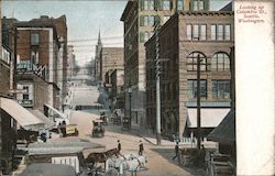 Looking up Columbia St Postcard