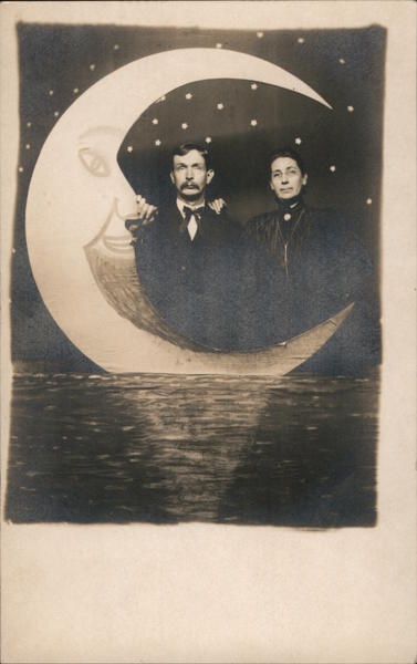 Paper Moon Couple Posing on Water with Crescent Moon