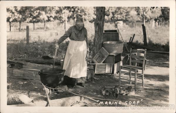 Making Soap A Woman Standing over an Outdoor Kettle
