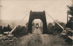 Car Transporting One Way Suspension Bridge Postcard