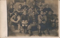 A Football Team Sitting on Steps Postcard Postcard Postcard