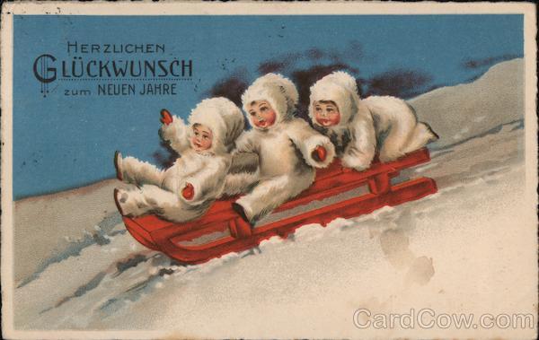 Three Children Going Down a Snowy Hill on a Sled