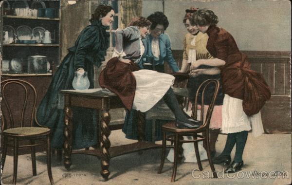 Five Woman Standing and Sitting Around a Table Women