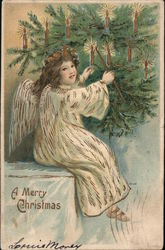 A Merry Christmas - Angel lighting candles on tree Angels Postcard Postcard Postcard