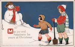 Children with Snowman playing in the snow Postcard