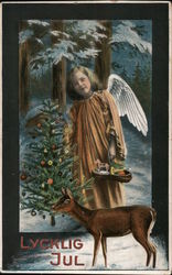 A Girl in Angel Wings Standing Next to a Christmas Tree Postcard
