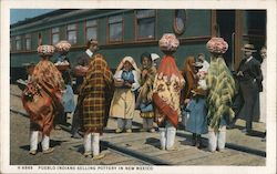 Pueblo Indians selling Pottery in New Mexico Postcard