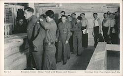 Recption Center - Being Fitted with Blouses and Trousers Postcard