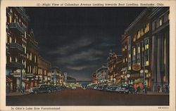 Night view of Columbus Avenue looking towards boat landing - In Ohio's Lake Erie Vacationland Postcard