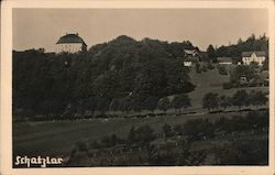 Meadows lined with trees beneath Schatzlar castle Postcard