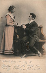 A woman standing next to a bench is adressed by a seated man Sweden Postcard Postcard Postcard