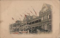 Large Building Festooned with United States and Japanese Flags Postcard