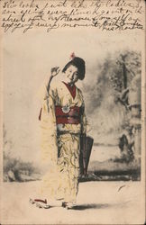 A geisha smiling and waving Postcard
