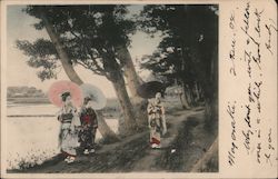 Geishas strolling on wooded pathway Postcard