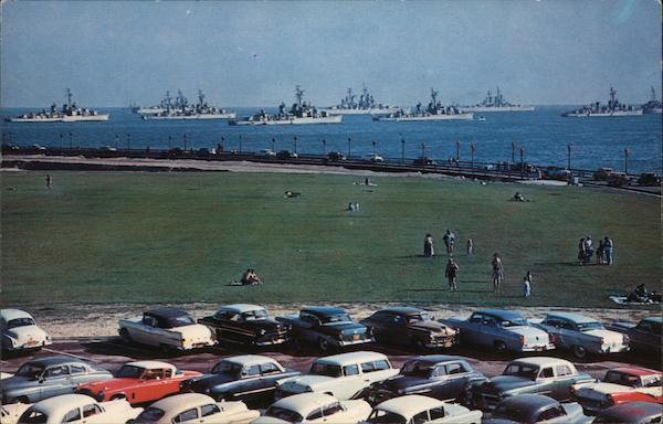 Ships of the U.S. Navy anchored offshore near the Horseshoe Pier Long Beach California