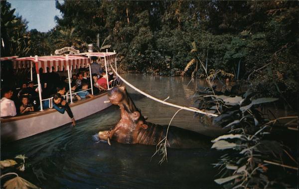 The Explorer's Boat approaches a hippo in Disneyland's Adventureland - Rivers of the World Anaheim California