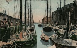 T. Wharf Largest fish market in the United States. Fishing boats docked. Postcard