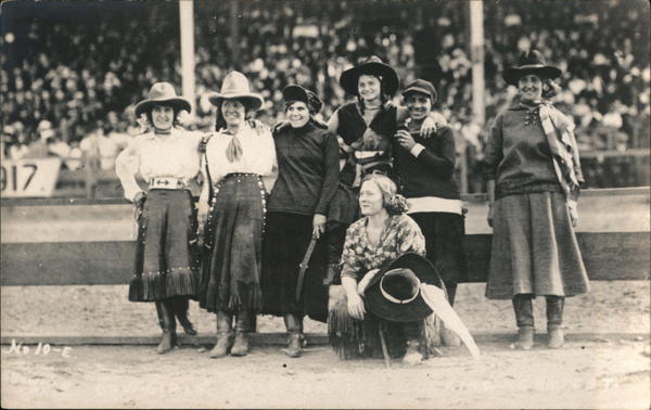 Rodeo Cowgirls grouping in an arena Rodeos