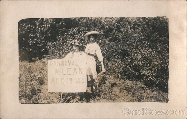 Two women holding sign - Carnival McLean, Aug 19-20-21 Virginia
