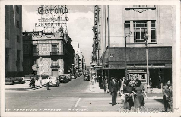 Francisco I. Madero Mexico Street with Mid-20th Century Vehicles and Ad Signage for Corona Modelo Sanborns and Menstril