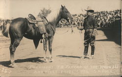 President T. D. Taylor of the Round Up and First Prize $350 Saddle Postcard