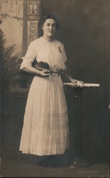 Young girl with violin, graduation certificate tied with bow Postcard