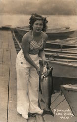 A Diamond Lake Beauty (Woman with fish) Postcard