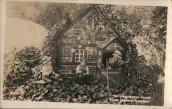 Busch Gardens. The gingerbread house, witch, little girl display Postcard