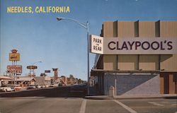 Hiway 66 follows Broadway through the city Postcard
